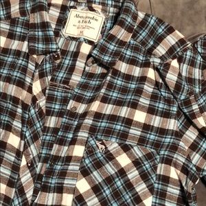 brown and blue flannel